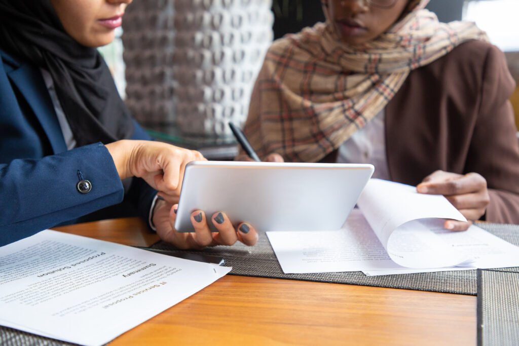 female professionals working documents